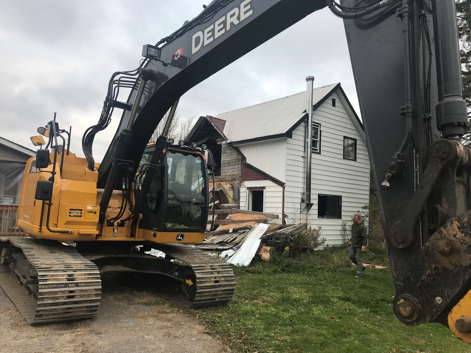 245 Excavator with hammer and root rake attachment
