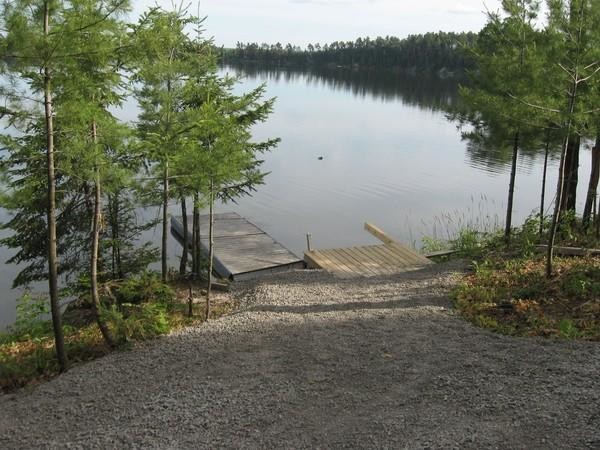 The finished product. Gravel pathways throughout the property and down to the lake.
